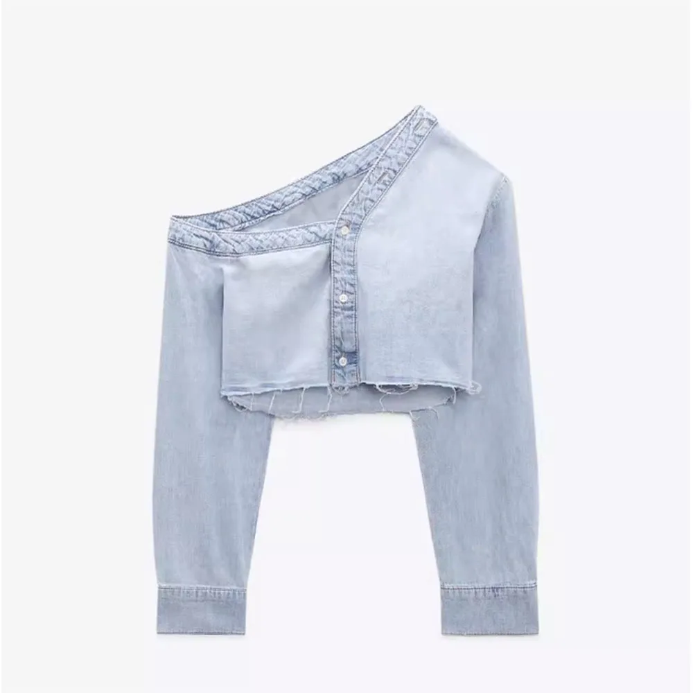 Early autumn new fashion women's retro street trend all-match asymmetric neckline long-sleeved denim shirt
Early autumn new fashion women's retro street trend all-match asymmetric neckline long-sleeved denim shirt