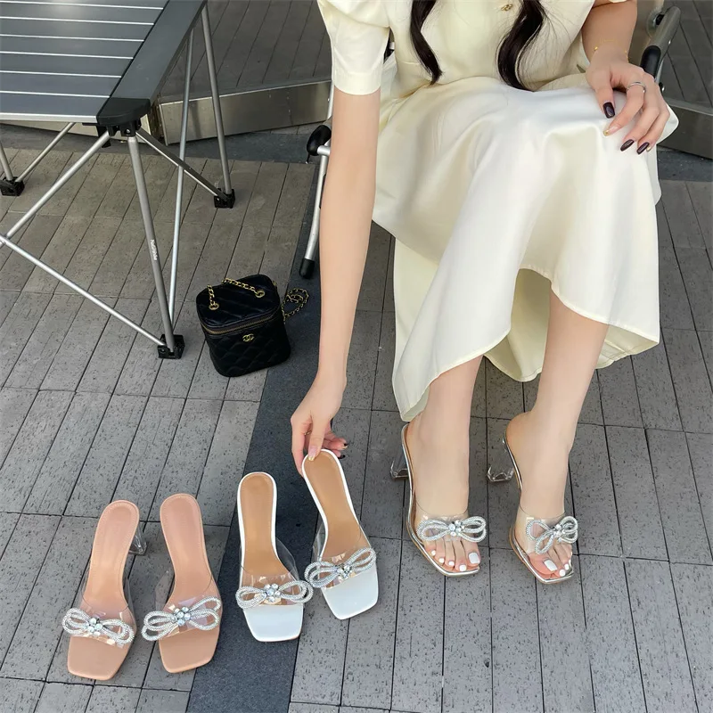 Сандалии женские на высоком каблуке, прозрачные босоножки с квадратным носком, бантом и стразами, на лето
Сандалии женские на высоком каблуке, прозрачные босоножки с квадратным носком, бантом и стразами, на лето