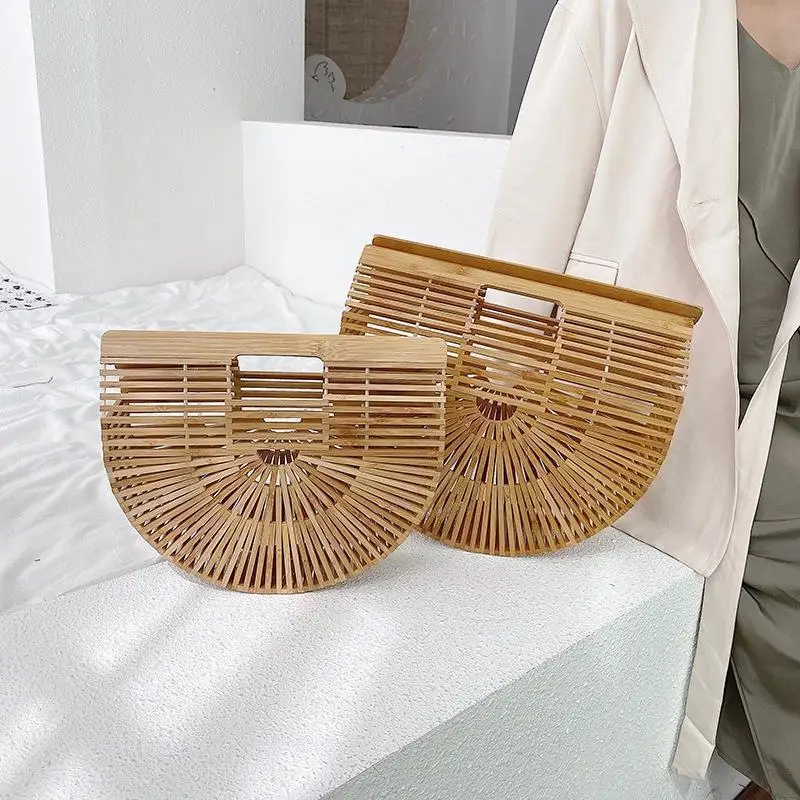 New Beach Bag Bamboo Bag Fashion Portable Half Round Bag Bamboo Wood Bag Versatile Hollow Woven Women's Bag 
New Beach Bag Bamboo Bag Fashion Portable Half Round Bag Bamboo Wood Bag Versatile Hollow Woven Women's Bag