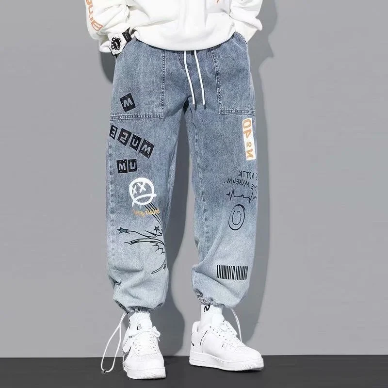 Men's jeans autumn letter printing baggy Hip hop jeans men cargo pants Streetwear Cartoon Graffiti Drawstring Denim trousers men
Men's jeans autumn letter printing baggy Hip hop jeans men cargo pants Streetwear Cartoon Graffiti Drawstring Denim trousers men