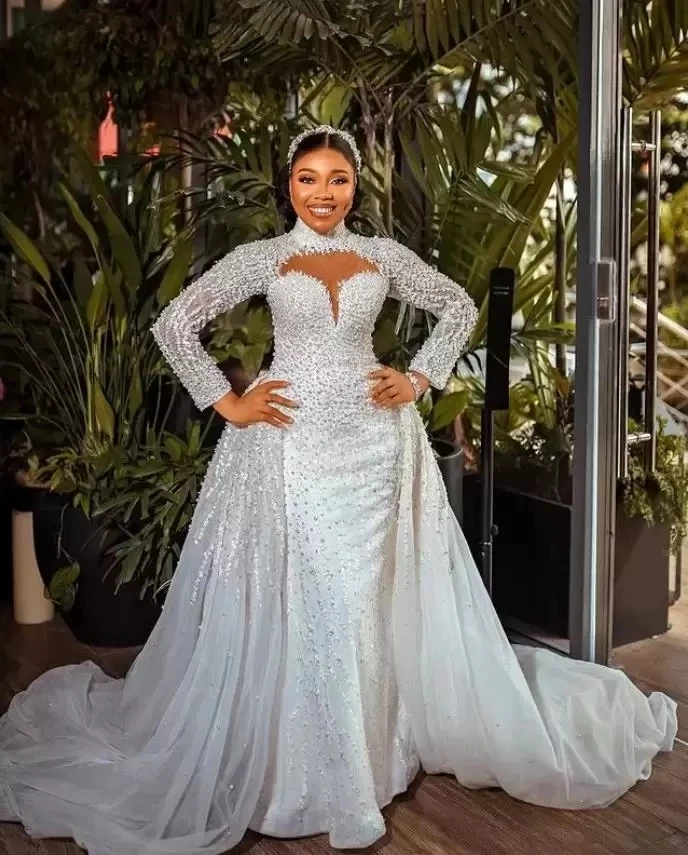 Plus Size Mermaid Wedding Dresses with Detachable Train 2023 Long Sleeve Luxury Pearls Lace Beaded African Aso Ebi Bridal Gown
Plus Size Mermaid Wedding Dresses with Detachable Train 2023 Long Sleeve Luxury Pearls Lace Beaded African Aso Ebi Bridal Gown