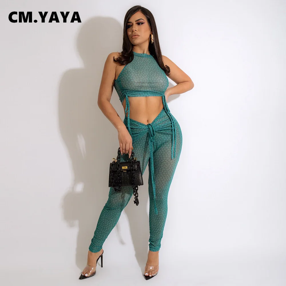 Соблазнительный пляжный сетчатый Прозрачный Женский комплект CM.YAYA, укороченный топ с рюшами и кулиской, леггинсы с оборками на талии, компл... 
Соблазнительный пляжный сетчатый Прозрачный Женский комплект CM.YAYA, укороченный топ с рюшами и кулиской, леггинсы с оборками на талии, компл...