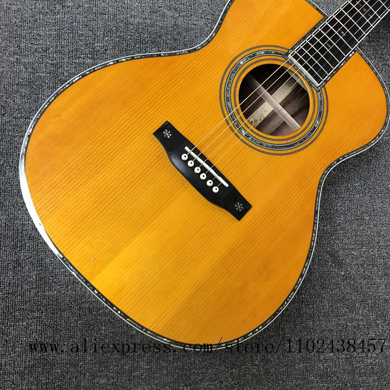 Custom guitar, solid spruce top, ebony fingerboard, rosewood sides and back, 39 " high-quality OM42 acoustic guitarras
Custom guitar, solid spruce top, ebony fingerboard, rosewood sides and back, 39 " high-quality OM42 acoustic guitarras