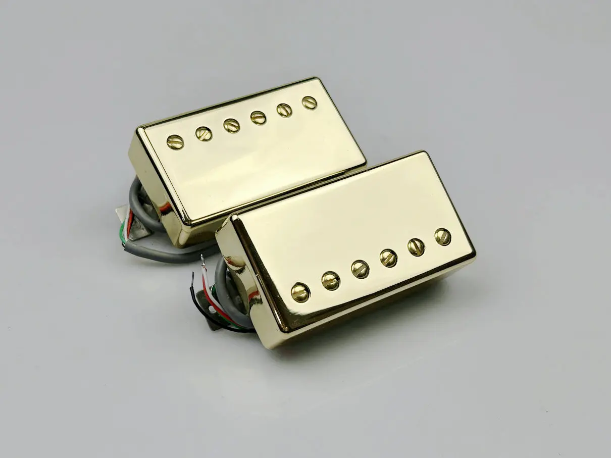 Звукосниматели для гитары Alnico V Gib BB1 BB2 Series PAF Humbucker звукосниматель 4C набор золотистых фотоэлементов
Звукосниматели для гитары Alnico V Gib BB1 BB2 Series PAF Humbucker звукосниматель 4C набор золотистых фотоэлементов