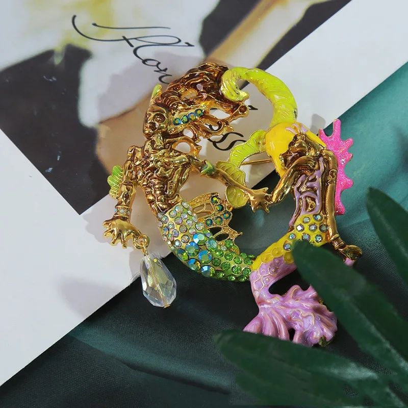 Popular Euro-american style Double mermaid Angel chest FK trend stereoscopic enamelled brooch
Popular Euro-american style Double mermaid Angel chest FK trend stereoscopic enamelled brooch