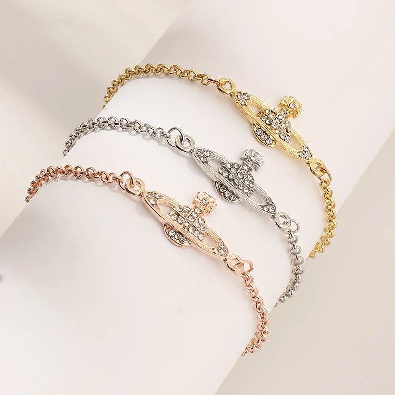Saturn Bracelet for Women Girls Rhinestone Planet Saturn Pendant Bracelet Chain Link Jewelry
Saturn Bracelet for Women Girls Rhinestone Planet Saturn Pendant Bracelet Chain Link Jewelry