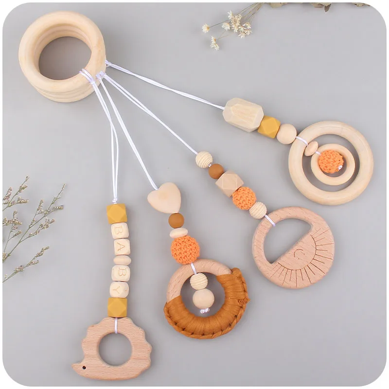 Baby Play Gym Wooden Beech Activity Gym Toy Baby Stroller Hanging Pendants Toys Teether Ring Nursing Rattle Toys Room Decor
Baby Play Gym Wooden Beech Activity Gym Toy Baby Stroller Hanging Pendants Toys Teether Ring Nursing Rattle Toys Room Decor