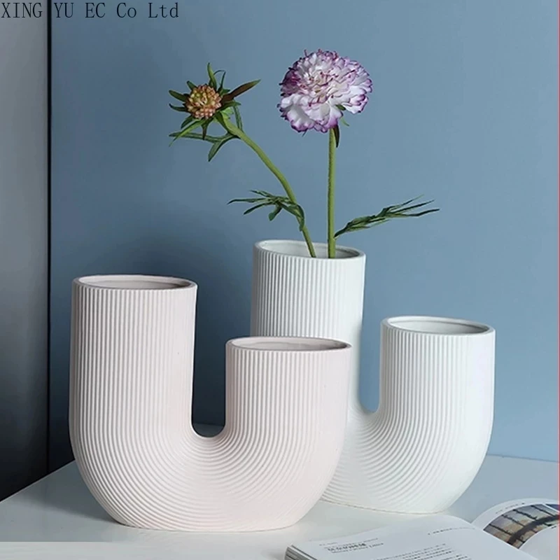 Simple and Creative U-shaped Ceramic Vase Living Room Dining Table Dried Flower Flower Arrangement Home Decoration Decoration
Simple and Creative U-shaped Ceramic Vase Living Room Dining Table Dried Flower Flower Arrangement Home Decoration Decoration