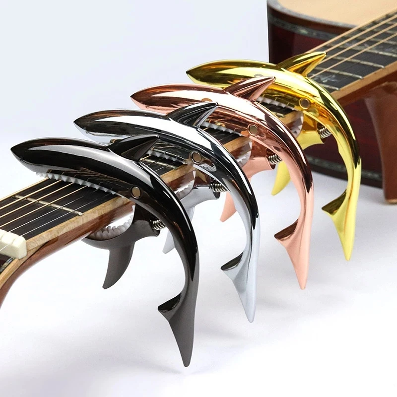 Metal Shark Zinc Alloy Guitar Tuning Clip Quick Change Clip String Guitar Instrument Accessories Ukulele Tuning Clip 4 Colors
Metal Shark Zinc Alloy Guitar Tuning Clip Quick Change Clip String Guitar Instrument Accessories Ukulele Tuning Clip 4 Colors