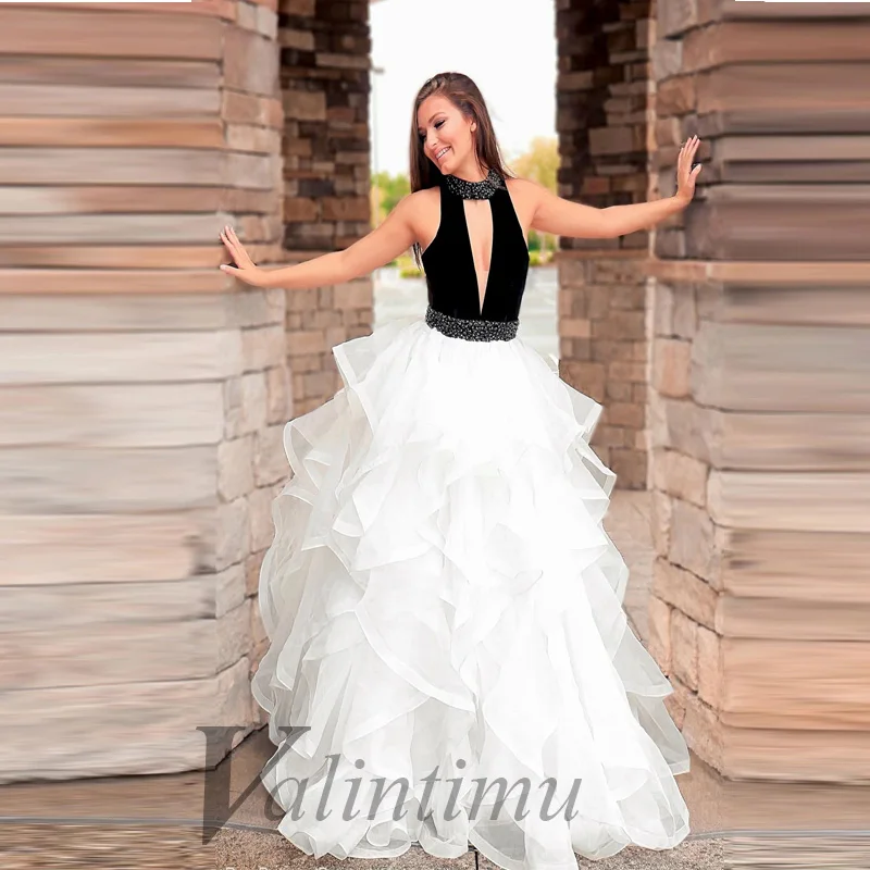 Sexy Backless Evening Dress Quinceanera Deep V-Neck Sleeveless Tiered Ball Gown Engagement Party Custom Made Abendkleider
Sexy Backless Evening Dress Quinceanera Deep V-Neck Sleeveless Tiered Ball Gown Engagement Party Custom Made Abendkleider
