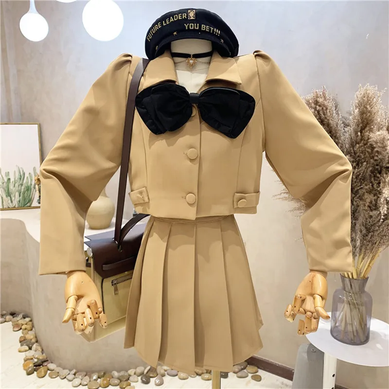 Niche Design New Women's Clothing 2022 Spring Design Sense Bow Short Suit Jacket + High Waist A-line Pleated Skirt two-piece Set
Niche Design New Women's Clothing 2022 Spring Design Sense Bow Short Suit Jacket + High Waist A-line Pleated Skirt two-piece Set