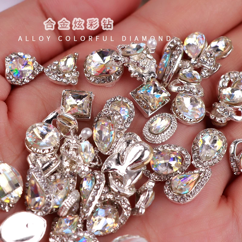 50PCS Nail Diamond Jewelry Charms zircon Multi-Shapes Nail Art Dangle Jewelry crystal cat's eye butterfly Bulk Nail Charms
50PCS Nail Diamond Jewelry Charms zircon Multi-Shapes Nail Art Dangle Jewelry crystal cat's eye butterfly Bulk Nail Charms