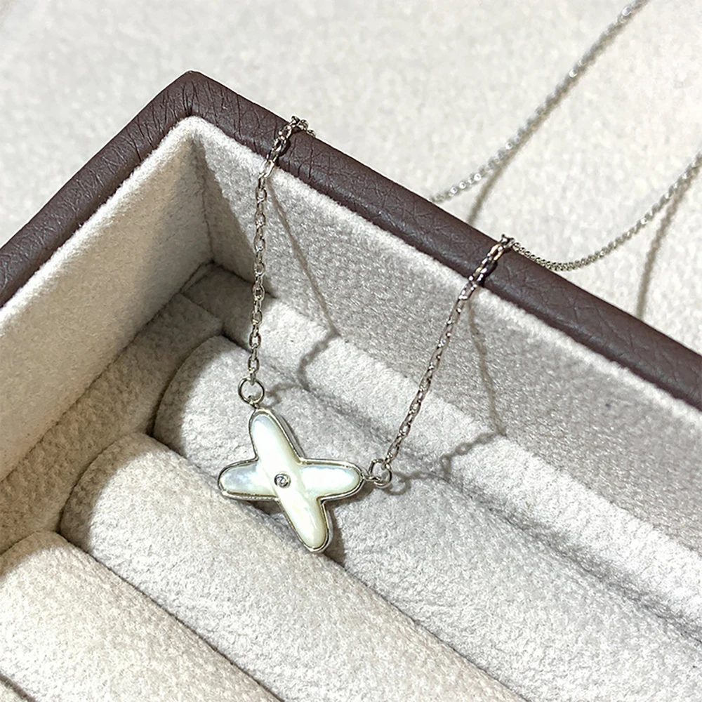 Новинка 2023, высококачественные ювелирные изделия, роскошное Брендовое ожерелье с крестом, женская подвеска из натуральной белой фритиларии, цепочка из 18-каратного розового золота с замком
Новинка 2023, высококачественные ювелирные изделия, роскошное Брендовое ожерелье с крестом, женская подвеска из натуральной белой фритиларии, цепочка из 18-каратного розового золота с замком