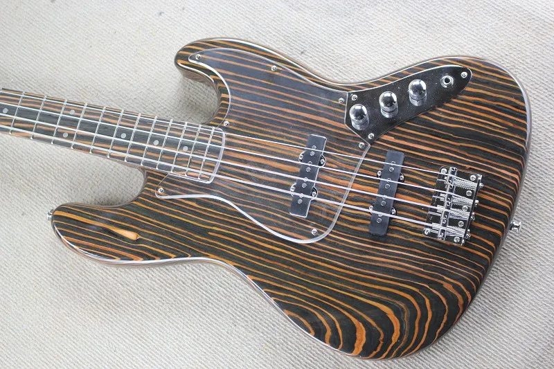 custom 4 string bass guitar, zebra pinto wood body,HH pickups,acrylic pickguard,chrome button,neck bolt on body
custom 4 string bass guitar, zebra pinto wood body,HH pickups,acrylic pickguard,chrome button,neck bolt on body