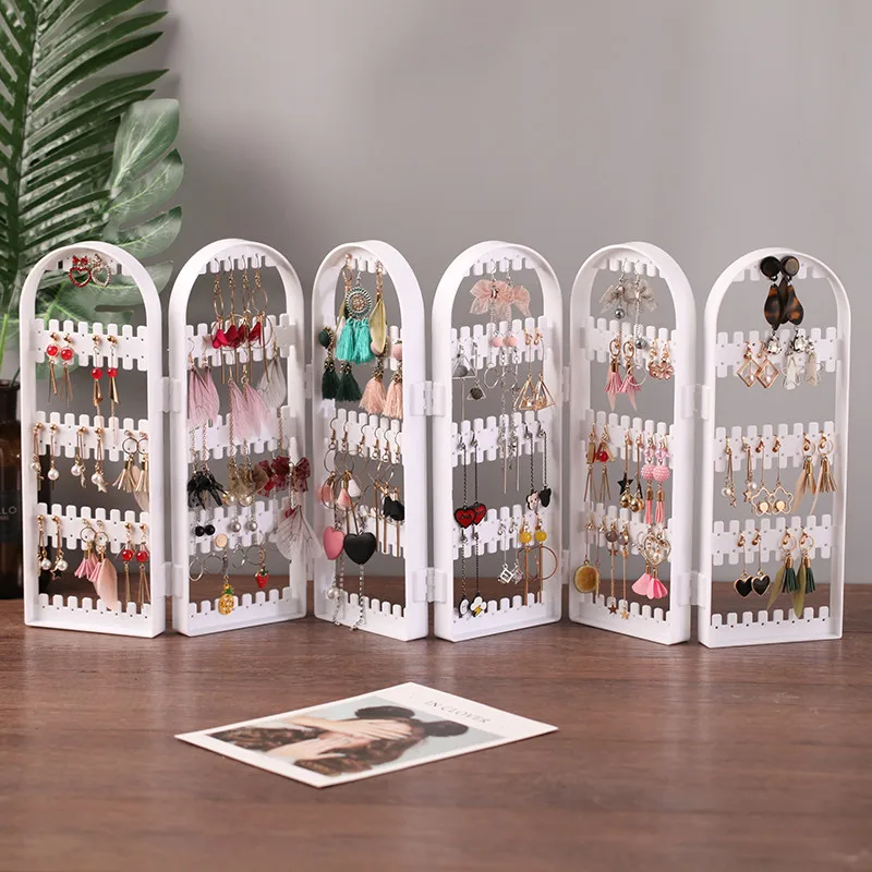 Household earrings Earnail storage rack Desktop jewelry rack Counter dust-proof ear clip Eardrop storage rack Mail package
Household earrings Earnail storage rack Desktop jewelry rack Counter dust-proof ear clip Eardrop storage rack Mail package