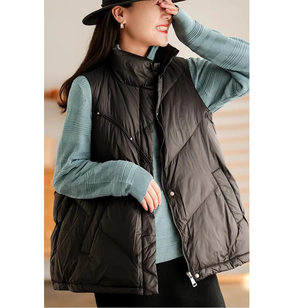 Women Winter 90% White Duck Down Vest Loose Zipper Sleeveless Puffer Jacket Female Stand Collar Ultra Light Waistcoat Down Coat
Women Winter 90% White Duck Down Vest Loose Zipper Sleeveless Puffer Jacket Female Stand Collar Ultra Light Waistcoat Down Coat