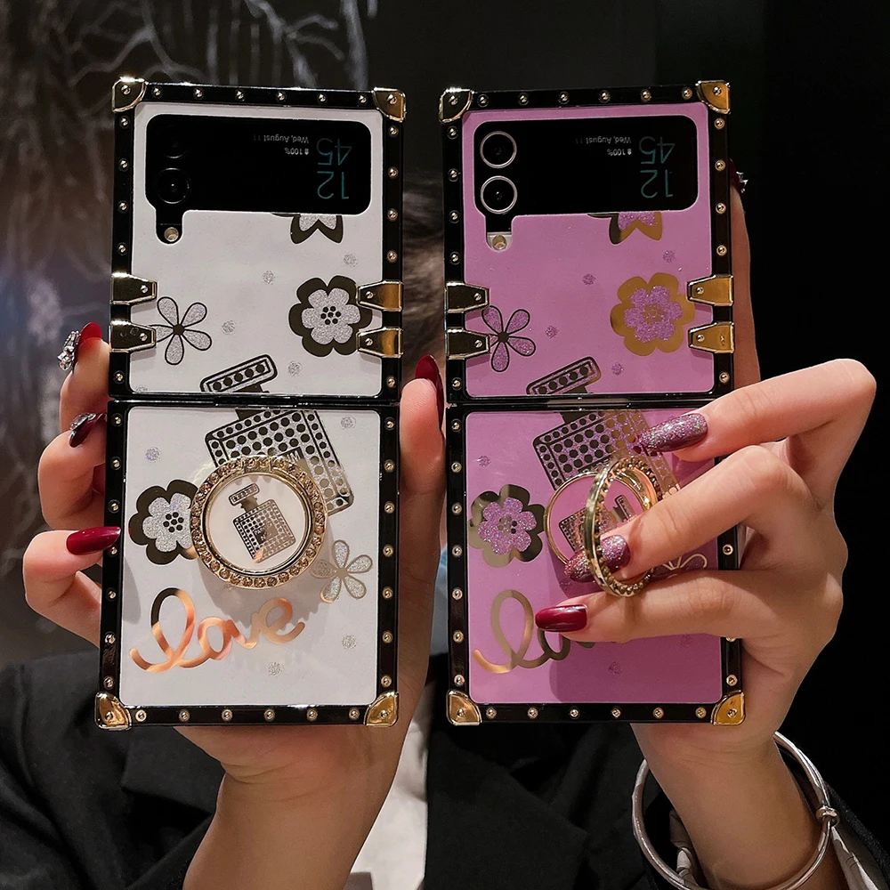 Чехол для телефона с гальваническим цветочным рисунком для Samsung Galaxy Z Flip 4 3, квадратный ударопрочный чехол с заклепками и кольцом-держателем в стиле панк
Чехол для телефона с гальваническим цветочным рисунком для Samsung Galaxy Z Flip 4 3, квадратный ударопрочный чехол с заклепками и кольцом-держателем в стиле панк