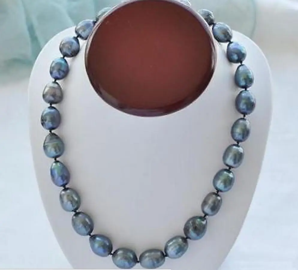 18inch AAA 9-10MM NATURAL SOUTH SEA BAROQUE GRAY PEARL NECKLACE 14K Clasp
18inch AAA 9-10MM NATURAL SOUTH SEA BAROQUE GRAY PEARL NECKLACE 14K Clasp