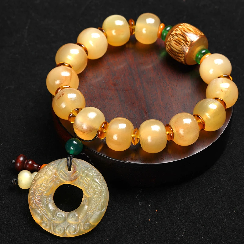 Tibetan sheep horn bracelet inlaid with gold wire safety buckle pendant bead bracelet men and women gourd with Italian gifts
Tibetan sheep horn bracelet inlaid with gold wire safety buckle pendant bead bracelet men and women gourd with Italian gifts