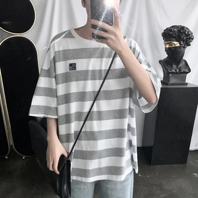 A Men's summer black and white striped short-sleeved trend casual loose wild half-sleeved T-shirt
A Men's summer black and white striped short-sleeved trend casual loose wild half-sleeved T-shirt