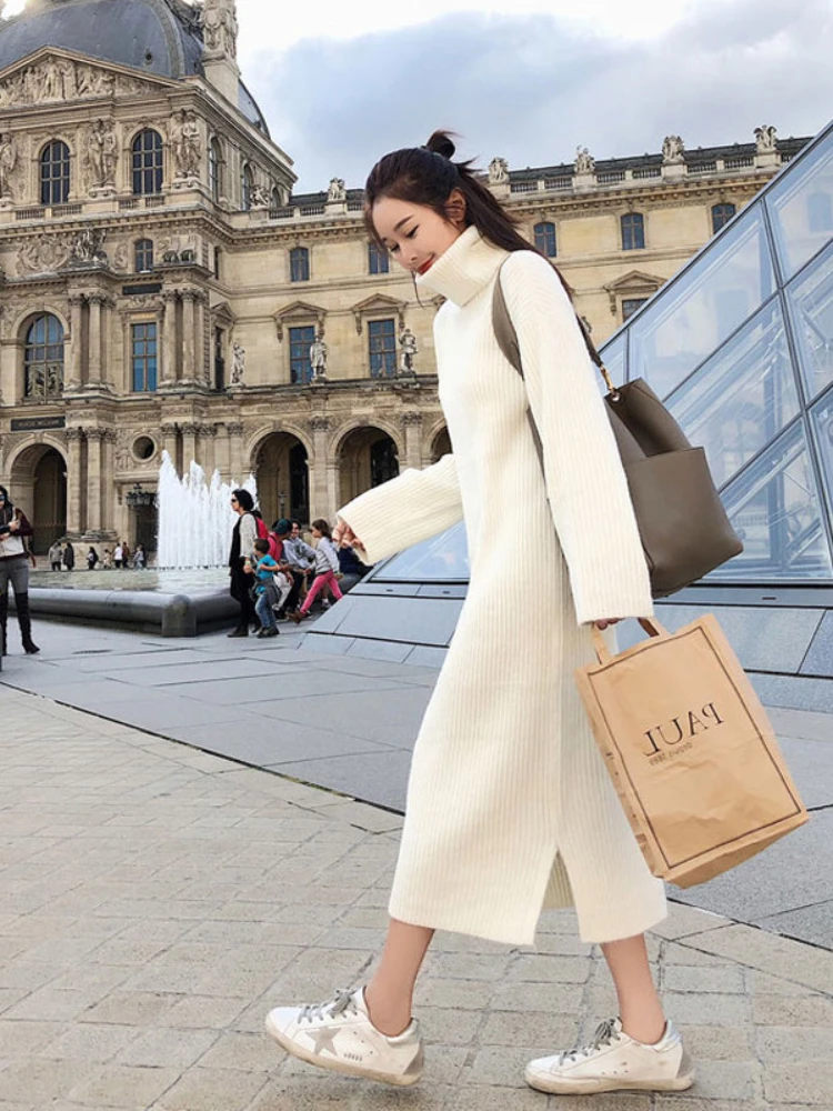 Женское вязаное платье-свитер средней длины, однотонный пуловер свободного покроя с высоким воротником и Боковым Разрезом, Осень-зима 2022
Женское вязаное платье-свитер средней длины, однотонный пуловер свободного покроя с высоким воротником и Боковым Разрезом, Осень-зима 2022