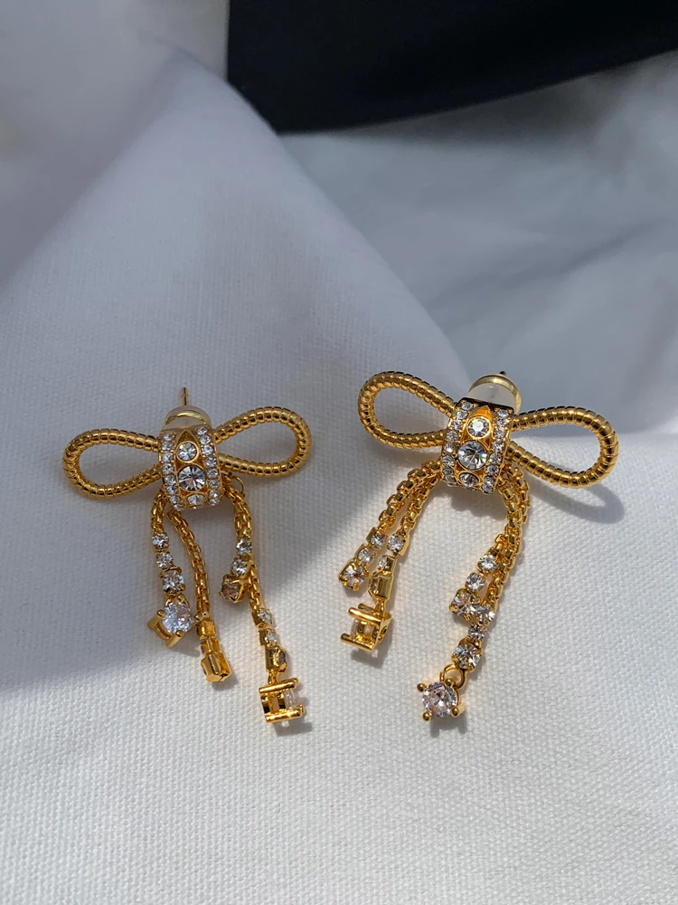 Unique Golden Long Flower Bow Tie Earrings Female Summer Special Interest Light Luxury Ins Personalized Earrings
Unique Golden Long Flower Bow Tie Earrings Female Summer Special Interest Light Luxury Ins Personalized Earrings
