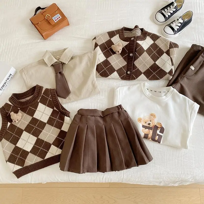 Children Boy Clothes Set Design Diamond Plaid Sweater Cardigan Sleeveless Knitted Vest Baby Girls Pleated Skirt Fashion Outfit
Children Boy Clothes Set Design Diamond Plaid Sweater Cardigan Sleeveless Knitted Vest Baby Girls Pleated Skirt Fashion Outfit