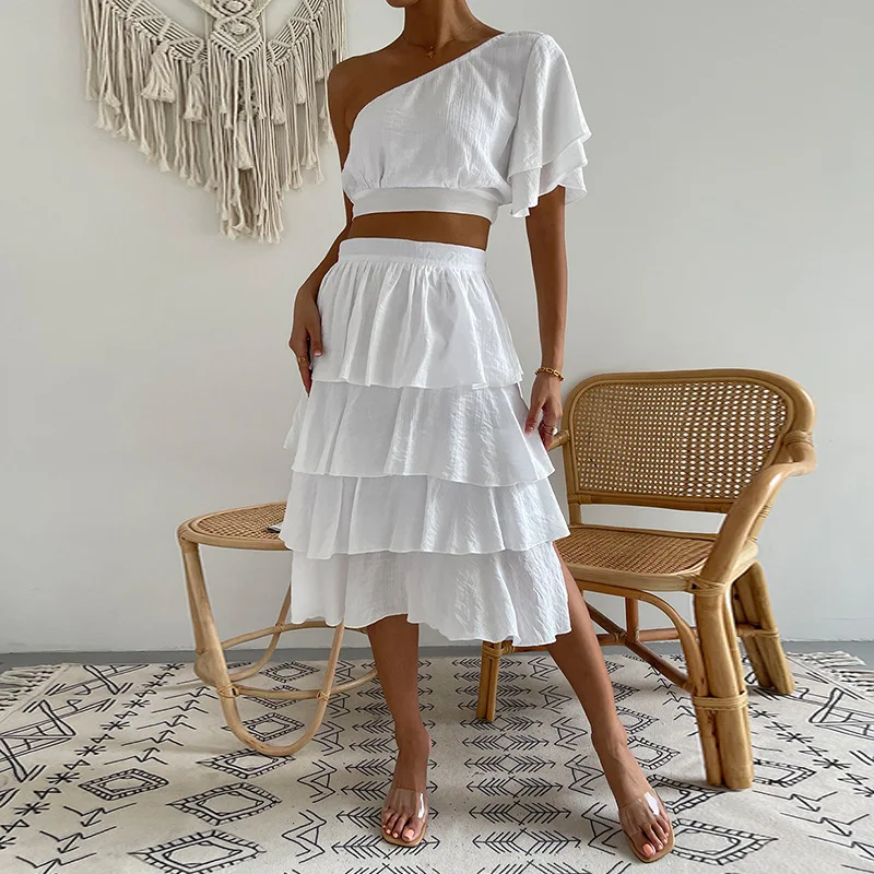 2022 Summer New Cake Skirt Asymmetrical Slanted Shoulder Top Fashion Suit White Ruffled Hem Skirt Two Piece Set Ceremony Loose
2022 Summer New Cake Skirt Asymmetrical Slanted Shoulder Top Fashion Suit White Ruffled Hem Skirt Two Piece Set Ceremony Loose