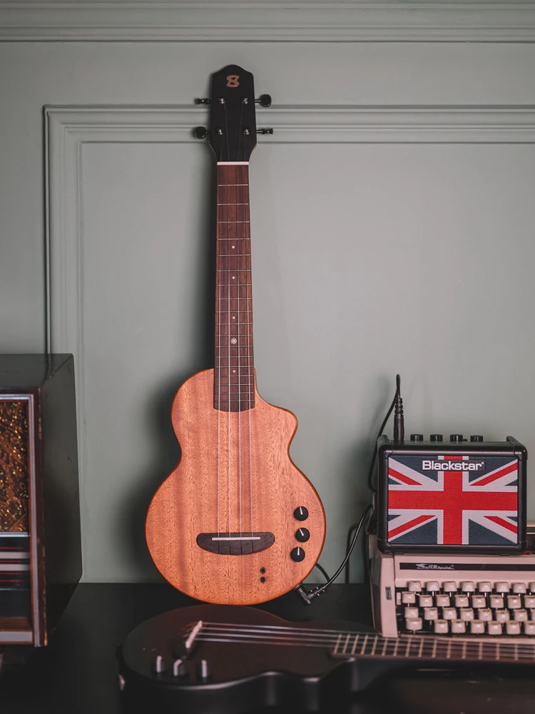 BrightSun BS002 Silent ukulele peach blossom core all-solid wood stage playing electro-acoustic guitar
BrightSun BS002 Silent ukulele peach blossom core all-solid wood stage playing electro-acoustic guitar