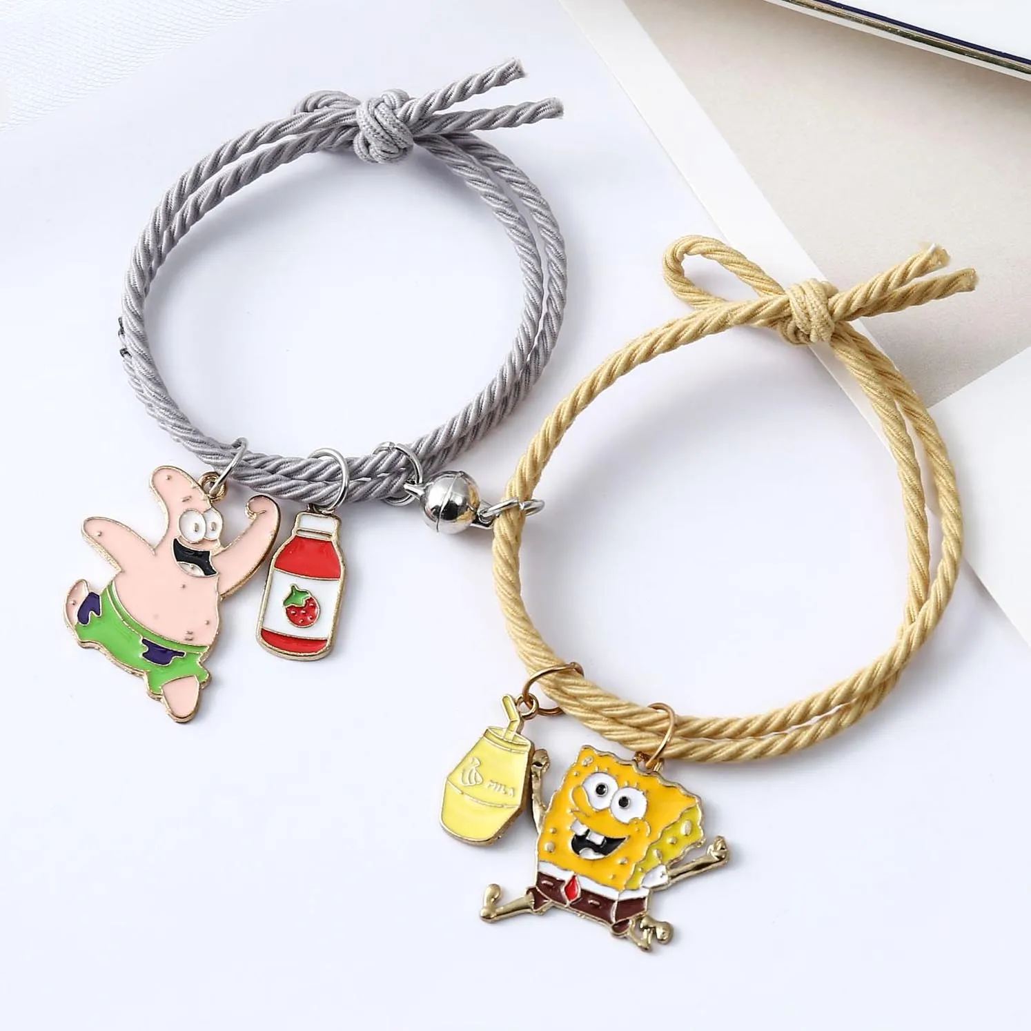 2pcs/set Best Friends Lover Couple Matching Charms Bracelets Cartoon Magnet Bell Bracelet Knot Head Rope Jewelry Friendship Gift 
2pcs/set Best Friends Lover Couple Matching Charms Bracelets Cartoon Magnet Bell Bracelet Knot Head Rope Jewelry Friendship Gift