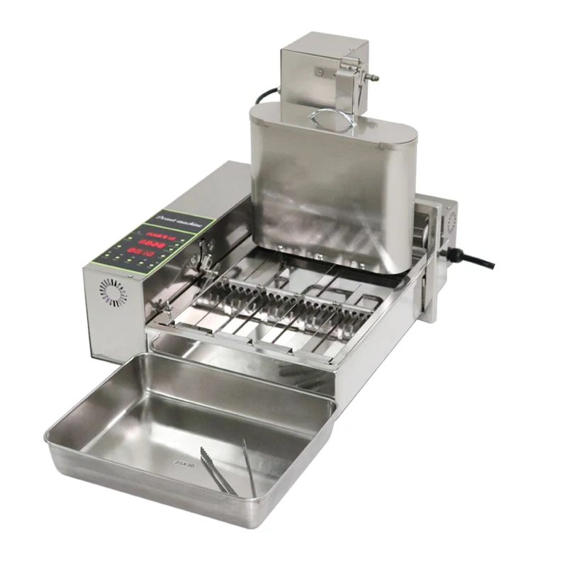 1800PCS/H Automatic Donut Maker/Donut Fryer/Four rows of mini doughnuts machine 2KW Donut machine
1800PCS/H Automatic Donut Maker/Donut Fryer/Four rows of mini doughnuts machine 2KW Donut machine