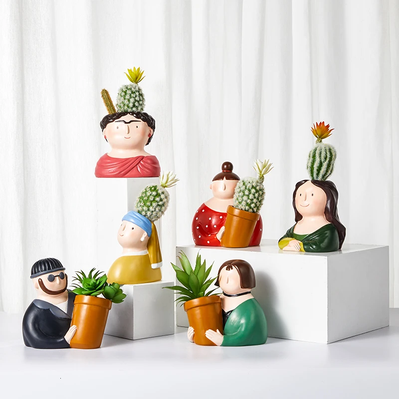 Florero de resina personaje de dibujos animados maceta cara humana florero suculento arreglo de flores sala de estar dormitorio
Florero de resina personaje de dibujos animados maceta cara humana florero suculento arreglo de flores sala de estar dormitorio