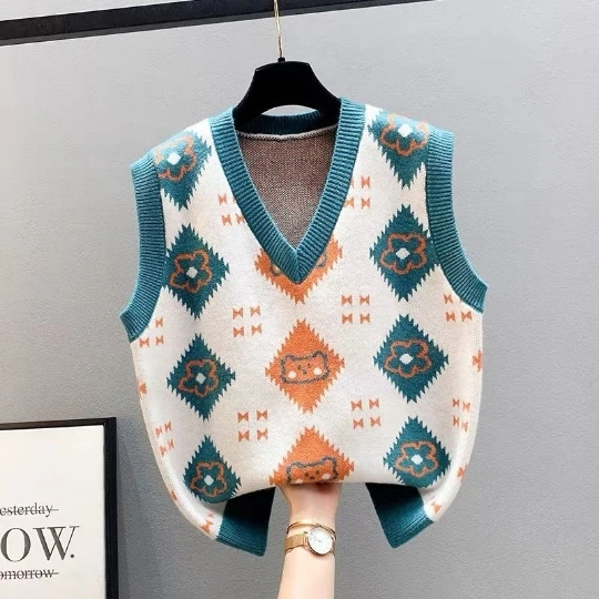 Трикотажный жилет с V-образным вырезом, без рукавов
Трикотажный жилет с V-образным вырезом, без рукавов