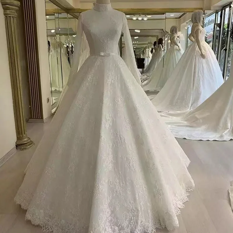 Elegant High Neck Wedding Dresses Lace Long Sleeves Muslim Back Zipper Tulle Appliques Pearl Beaded With Bow Gonws vestido
Elegant High Neck Wedding Dresses Lace Long Sleeves Muslim Back Zipper Tulle Appliques Pearl Beaded With Bow Gonws vestido