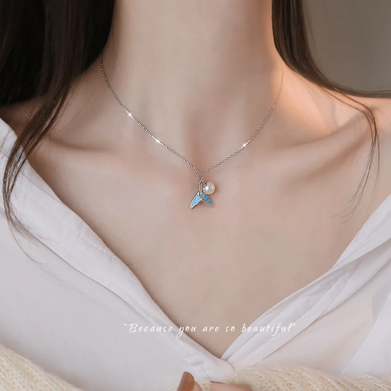 Ожерелье из серебра S925 пробы с голубым рыбьим хвостом, аксессуары с жемчугом и Китом, персонализированный и креативный Дельфин
Ожерелье из серебра S925 пробы с голубым рыбьим хвостом, аксессуары с жемчугом и Китом, персонализированный и креативный Дельфин
