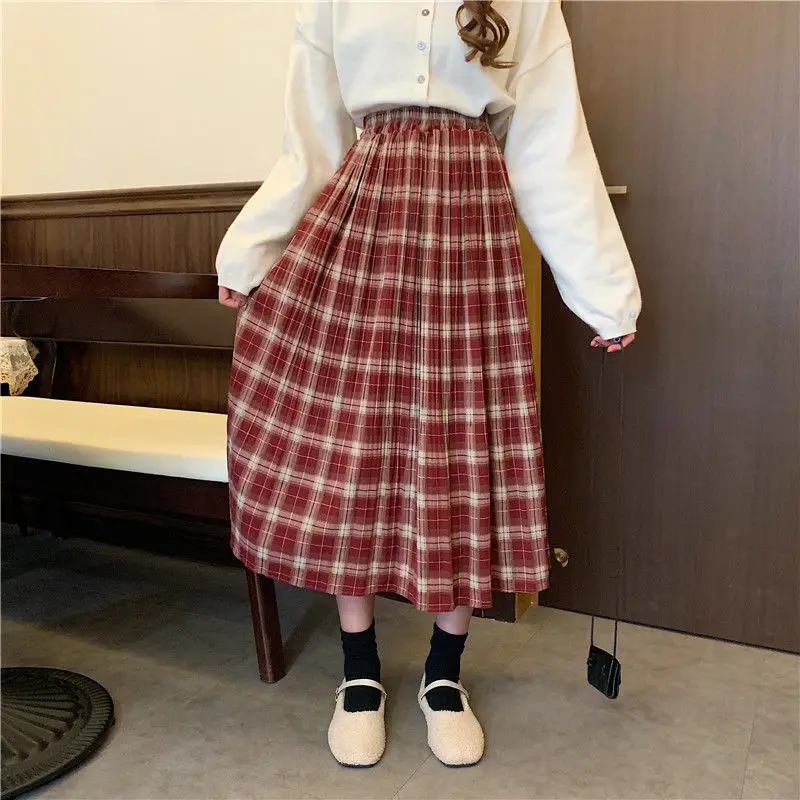 Skirts Women Elastic Waist New Plaid Pleated Red Black Solid Korean Style Sweet Girls School Students Slim All-match Long Womens 
Skirts Women Elastic Waist New Plaid Pleated Red Black Solid Korean Style Sweet Girls School Students Slim All-match Long Womens