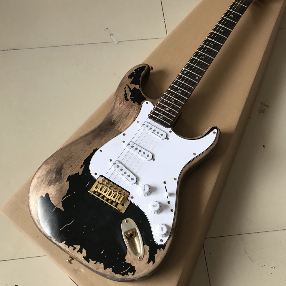 Relic black electric guitar, rosewood fingerboard, gold hardware, free shipping
Relic black electric guitar, rosewood fingerboard, gold hardware, free shipping