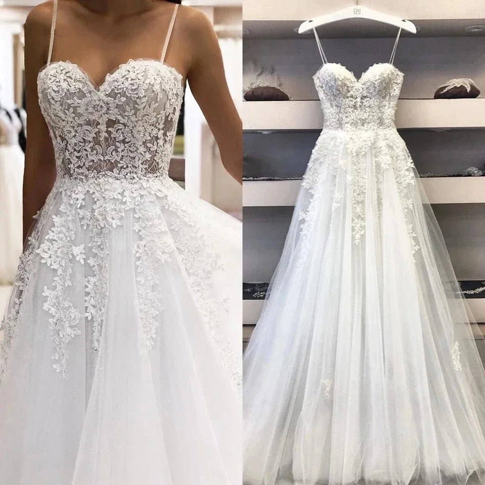 ANGELSBROIDEP A-Line Wedding Dress Spaghetti Straps Vintage Lace Applique Beaded Off White Tulle Mariage Long Bridal Dress HOT
ANGELSBROIDEP A-Line Wedding Dress Spaghetti Straps Vintage Lace Applique Beaded Off White Tulle Mariage Long Bridal Dress HOT