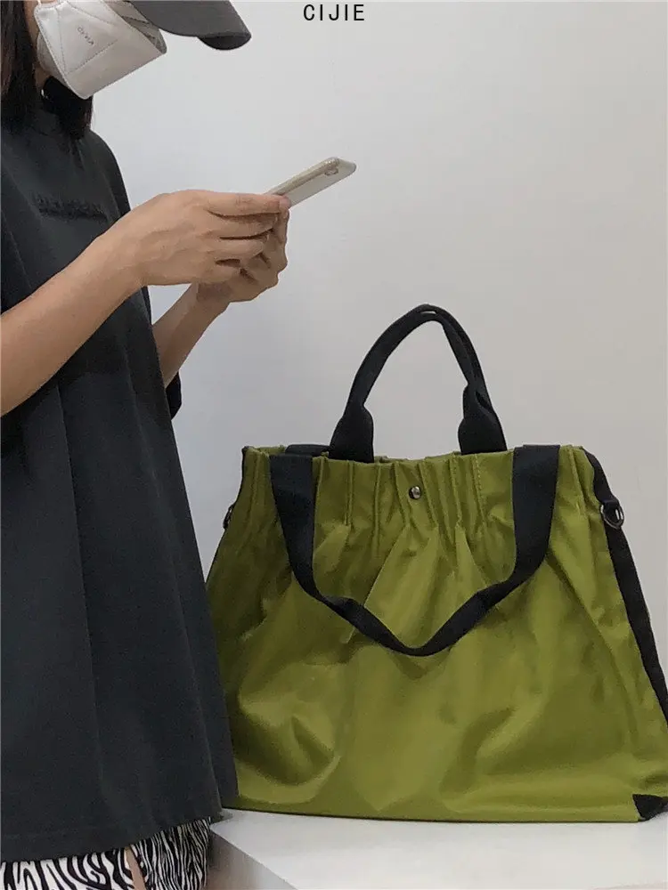 European and American Fashion Oxford Cloth Pleated All-Matching and Lightweight Shoulder Crossbody Tote Bag
European and American Fashion Oxford Cloth Pleated All-Matching and Lightweight Shoulder Crossbody Tote Bag