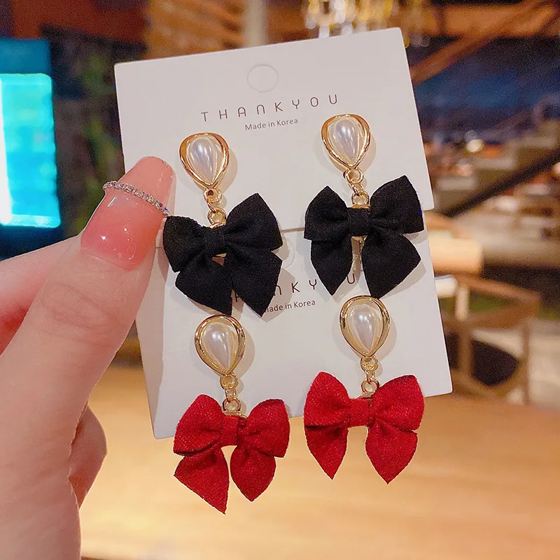 New Simple Fashion Red Bowknot Pearl S925 Silver Needle Earrings Women's Temperament All-match Earrings
New Simple Fashion Red Bowknot Pearl S925 Silver Needle Earrings Women's Temperament All-match Earrings