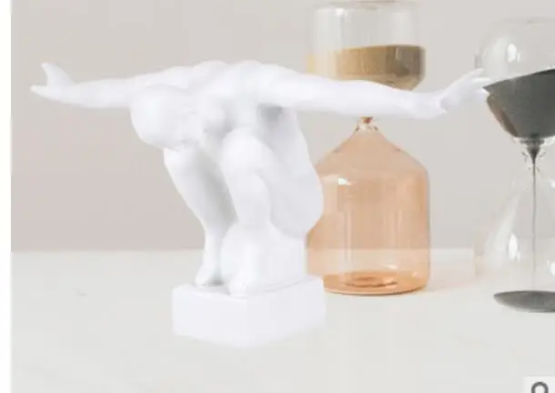 Resin crafts light luxury modern simple creative home decoration wing sports flying man sculpture pendulum
Resin crafts light luxury modern simple creative home decoration wing sports flying man sculpture pendulum
