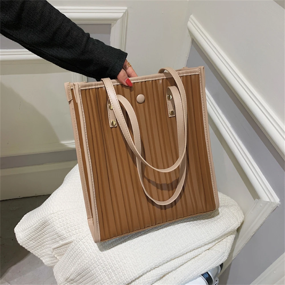 Women's PU leather folding handbag, large capacity belt handbag, brand design, composite materials
Women's PU leather folding handbag, large capacity belt handbag, brand design, composite materials
