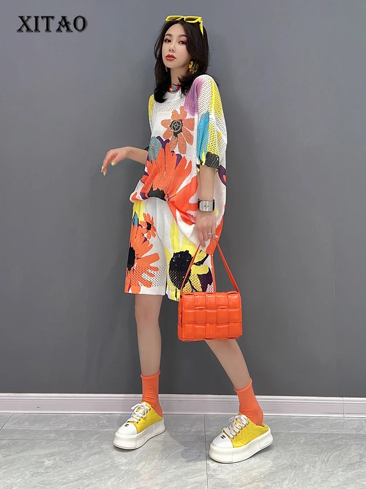 XITAO Knitted Print Two Piece Set Women Fashion Half Sleeve Top Hollow Out Elastic Waist Shorts Minority Elegant 2022 WMD7117
XITAO Knitted Print Two Piece Set Women Fashion Half Sleeve Top Hollow Out Elastic Waist Shorts Minority Elegant 2022 WMD7117