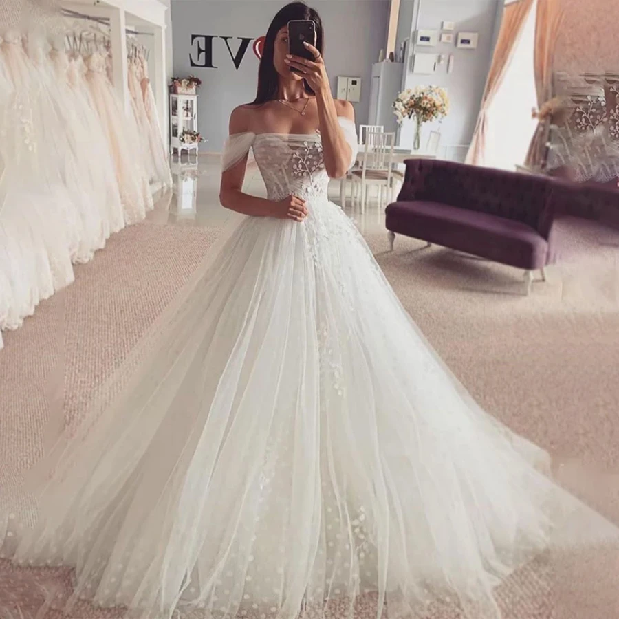 

Romantic Off-The-Shoulder Tulle Ball Gown Wedding Dresses with Applique Lace Details Perfect Bridal Dresses
