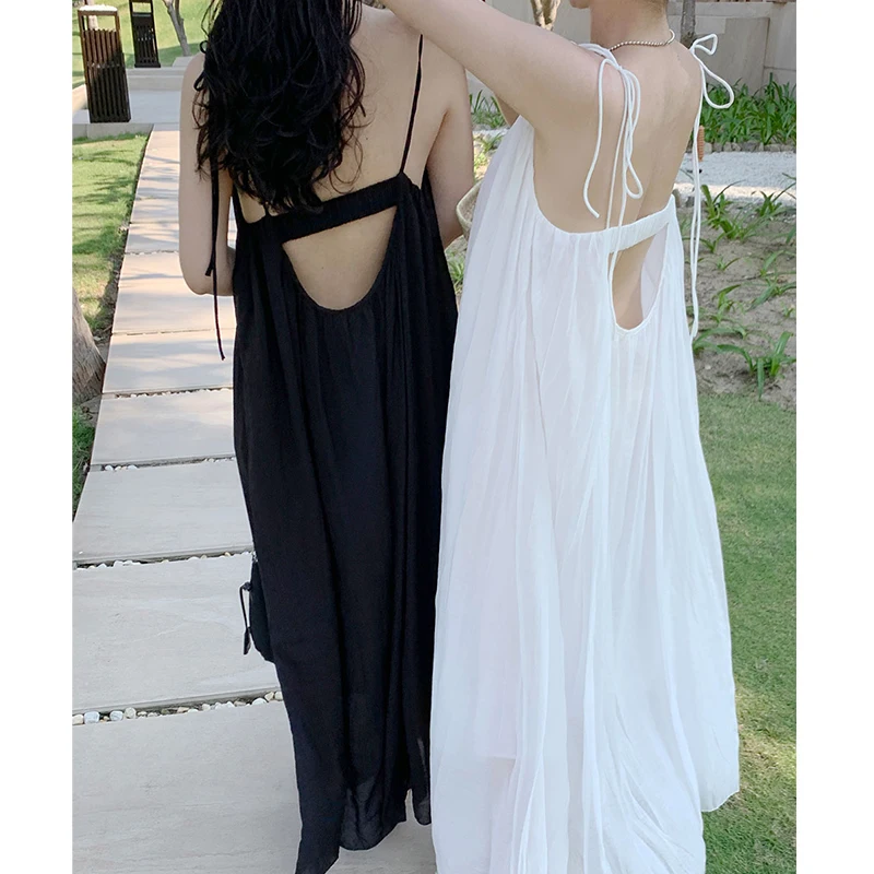 Clothland Women Sexy White Black Strap Dress Bow Tie Spaghetti Straps Sleeveless Backless Midi Dresses Mujer QC658
Clothland Women Sexy White Black Strap Dress Bow Tie Spaghetti Straps Sleeveless Backless Midi Dresses Mujer QC658