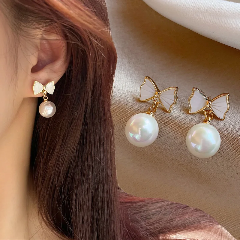 Women's Personality Bow Knot Earrings Pearl Pendant Dangle Earrings Exquisite Temperament Jewelry Gift
Women's Personality Bow Knot Earrings Pearl Pendant Dangle Earrings Exquisite Temperament Jewelry Gift