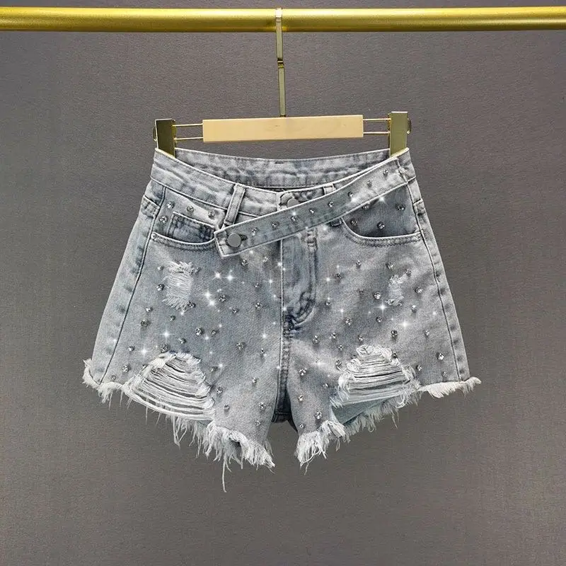Изысканные женские рваные джинсы, короткие брюки, новая модная летняя женская одежда с высокой талией, стройнящие широкие брюки, джинсовые шорты
Изысканные женские рваные джинсы, короткие брюки, новая модная летняя женская одежда с высокой талией, стройнящие широкие брюки, джинсовые шорты