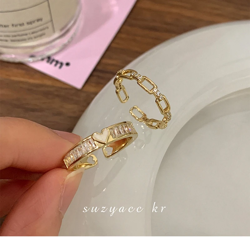 Zircon Chain Hollow Out Heart Ring Summer Accessories Women Sets Round Rings Fashion Trend Luxury Designer 2023 Jewelry Korean
Zircon Chain Hollow Out Heart Ring Summer Accessories Women Sets Round Rings Fashion Trend Luxury Designer 2023 Jewelry Korean