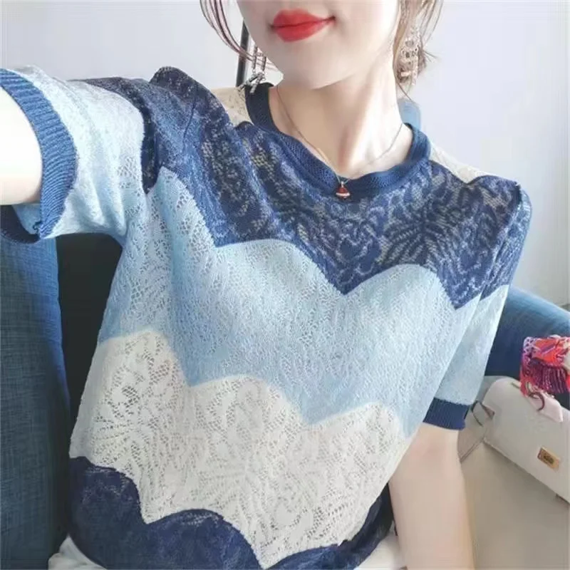 Hollow short sleeve female 2021 summer new loose large size color matching coat student Korean knitted bottoming shirt
Hollow short sleeve female 2021 summer new loose large size color matching coat student Korean knitted bottoming shirt