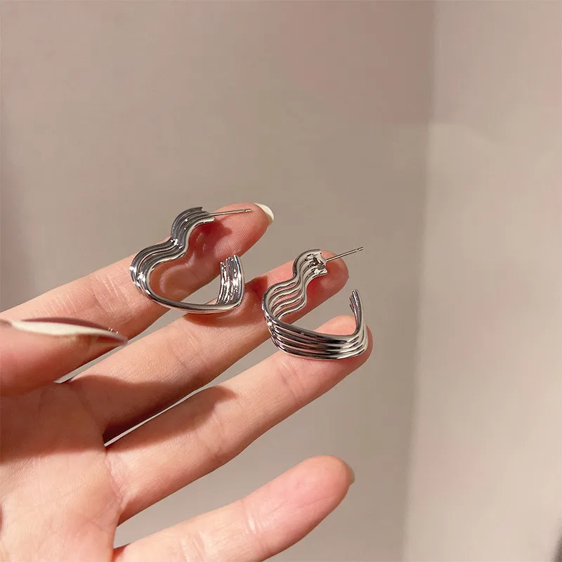 Minar Stylish Hollow Multi Layered Love Heart Earring for Women Silver Color Metal Open Hoop Earrings Korean Style Jewelry 2022
Minar Stylish Hollow Multi Layered Love Heart Earring for Women Silver Color Metal Open Hoop Earrings Korean Style Jewelry 2022